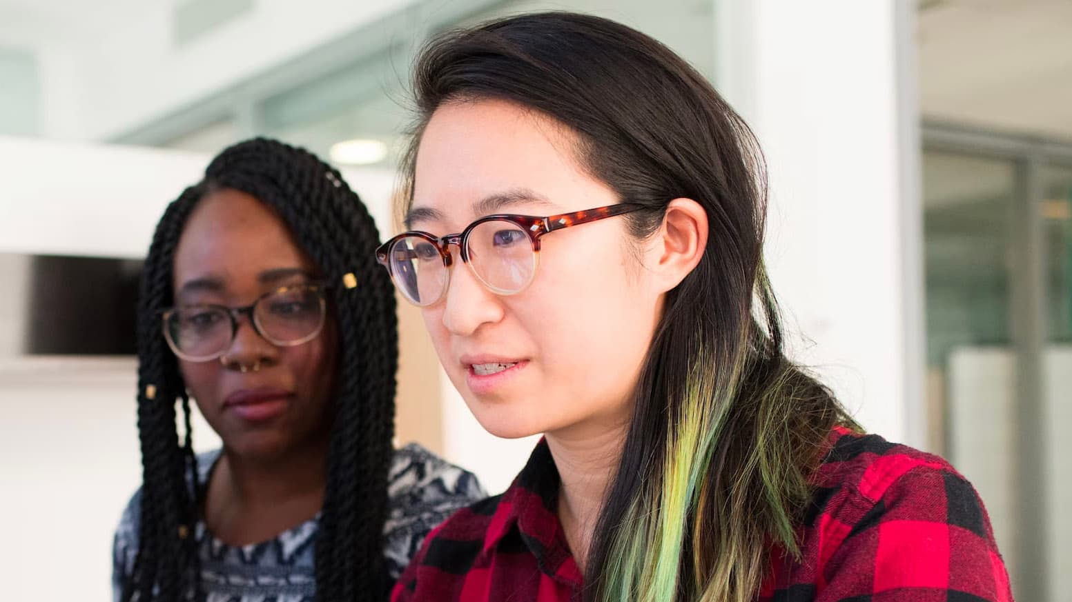 Stephane Agoume at work with a colleague